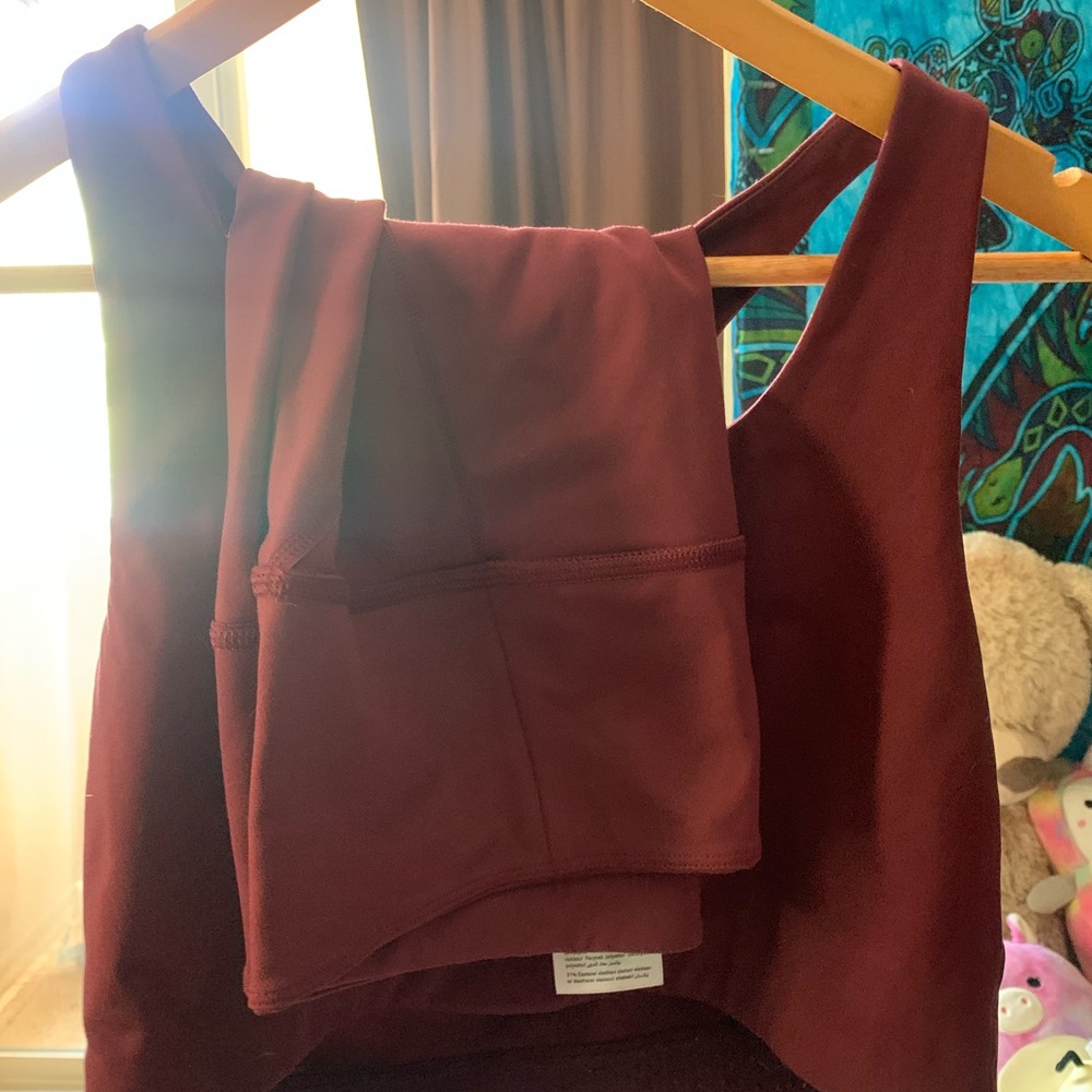 Maroon Girlfriend Collective Compressive Sports Bra and High waisted Bike Shorts